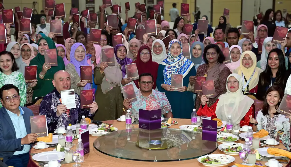 Selangor menteri besar Amirudin Shari (centre) with executive councillor Anfaal Saari (seated, second from right) at the launch of the action plan in Shah Alam.